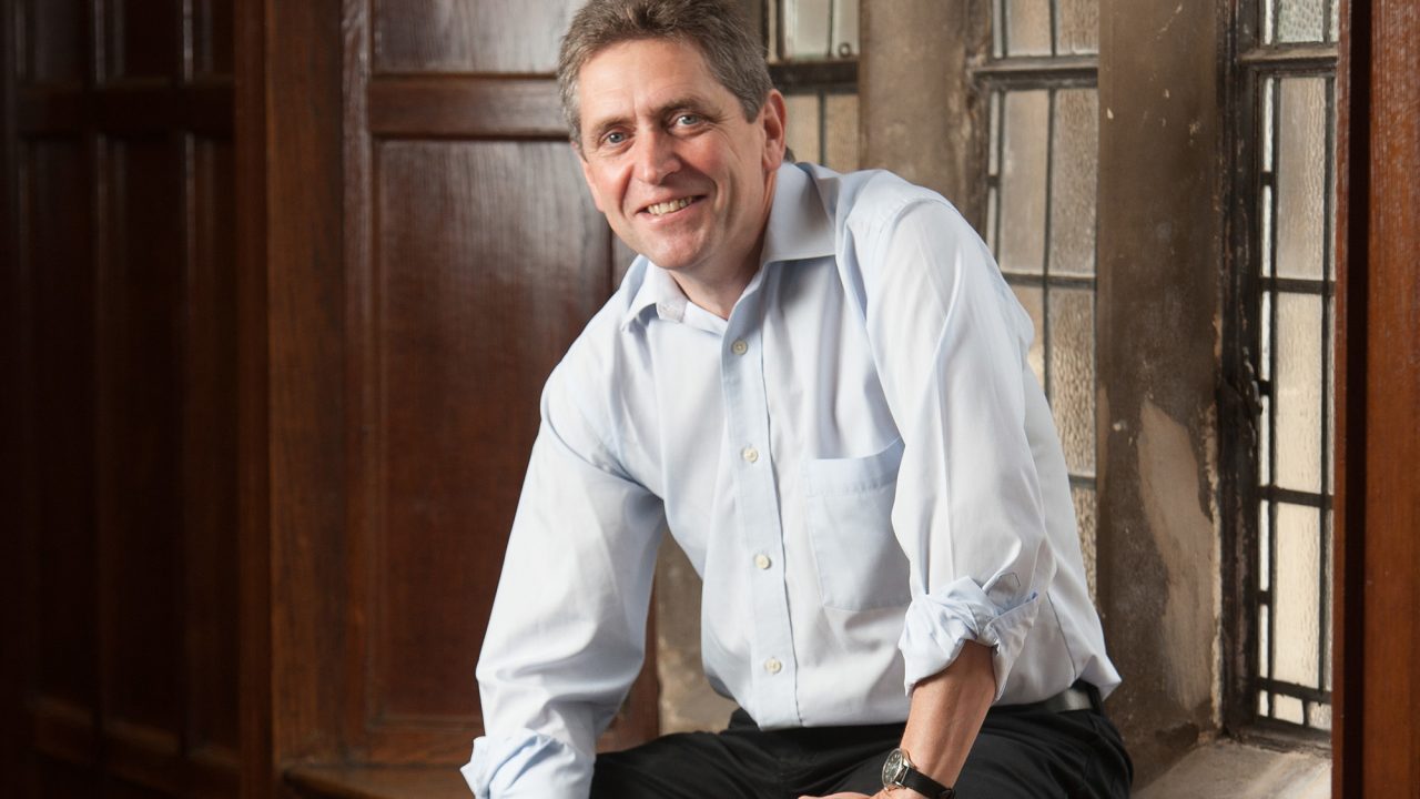 paul-vare Lecturer sitting on a windowsill