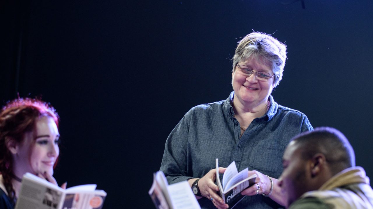 Sue Colverd 2 Lecturer talking to students under spotlights