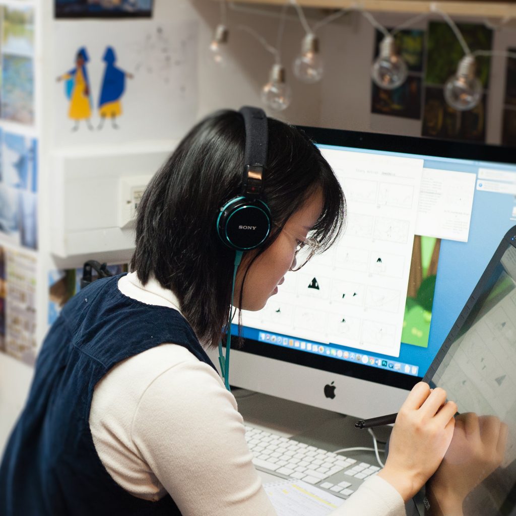 student drawing on a digital easel