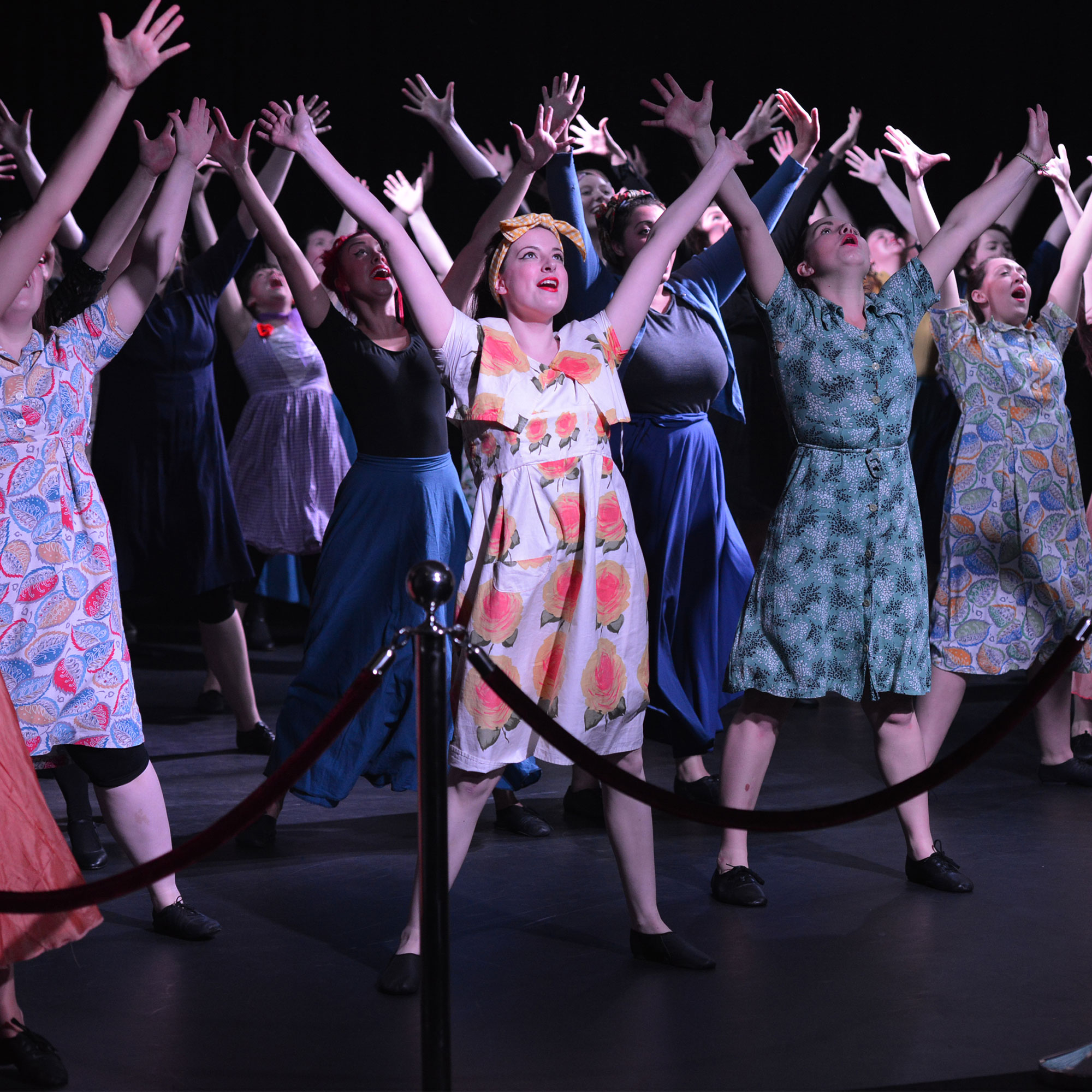 Students performing onstage