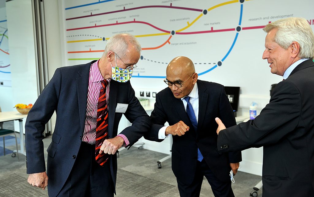 University of Gloucestershire Vice-Chancellor, Stephen Marston, touching elbows to greet HE Dr Desra Percaya - the Ambassador of the Republic of Indonesia to the United Kingdom, and MP for Gloucester, Richard Graham, who is the Prime Minister’s Trade Envoy to Indonesia.