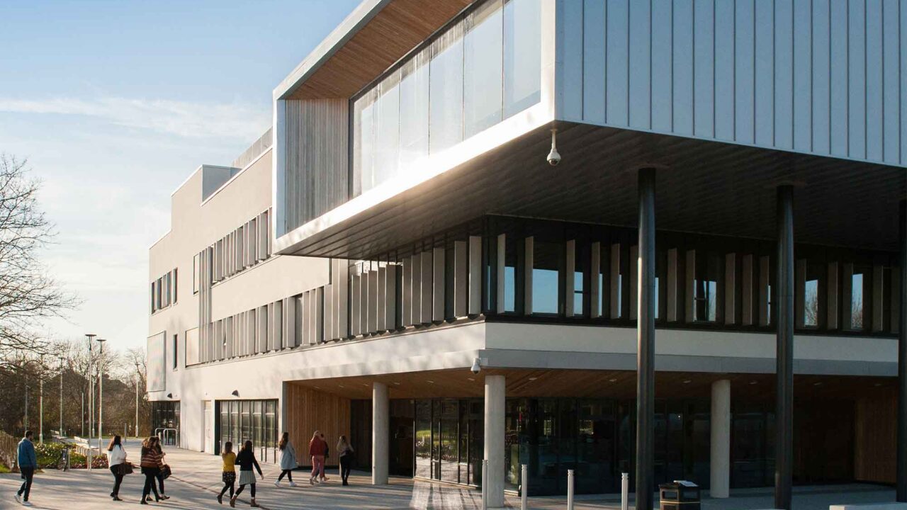 Students walking into Gloucestershire Business School