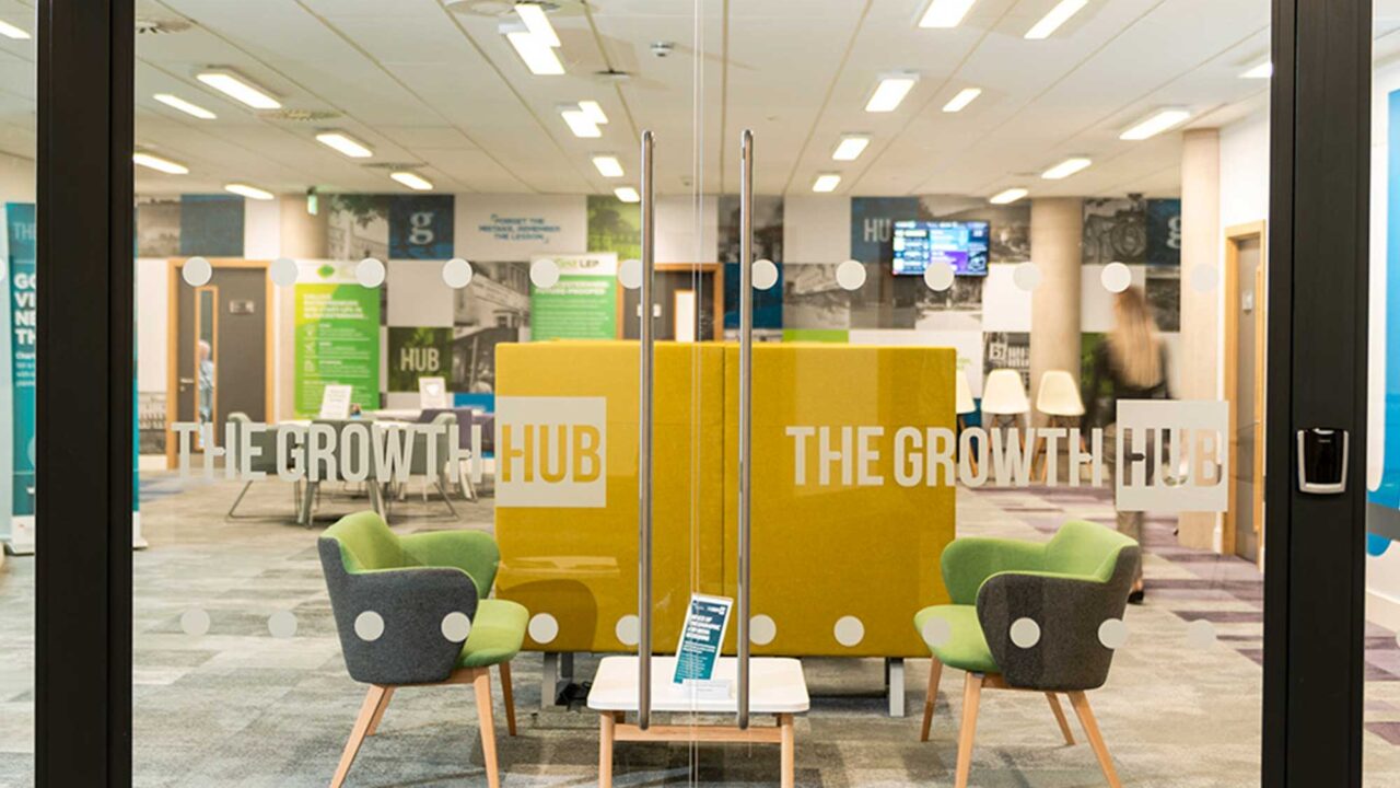 The Growth Hub glass double doors leading into the main space.