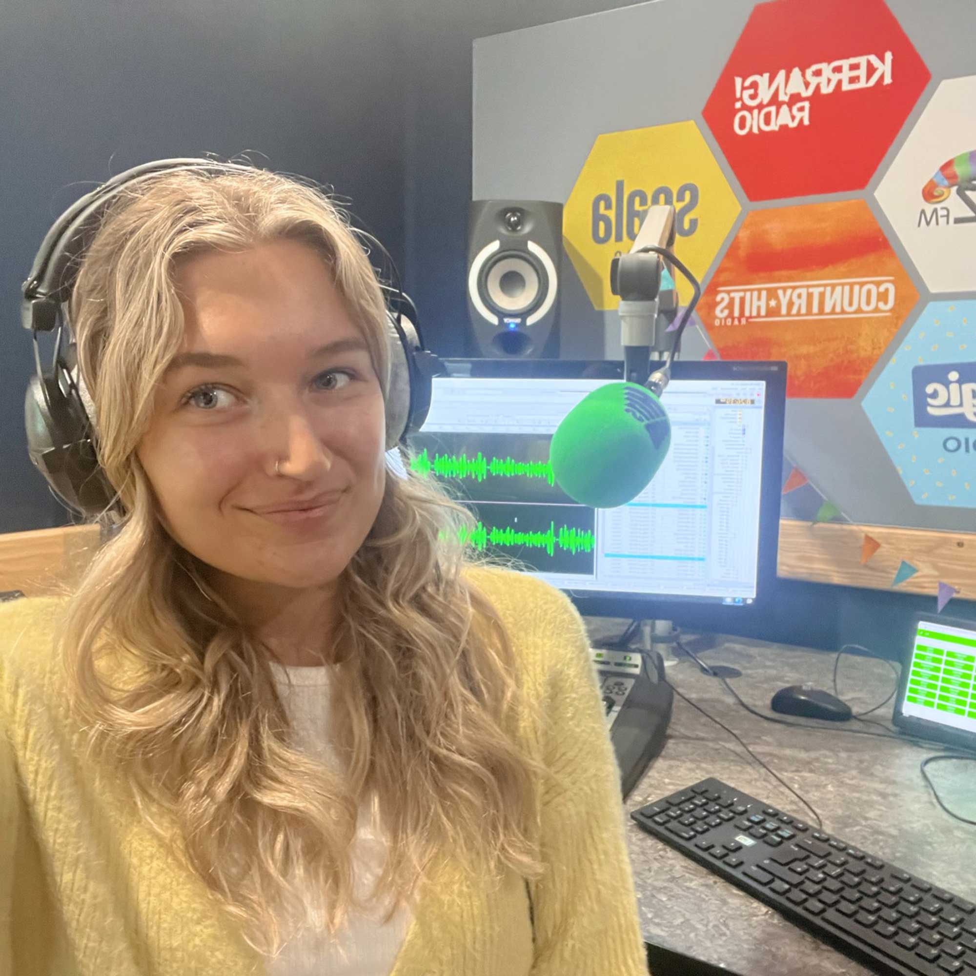 Female radio presenter wearing headphones