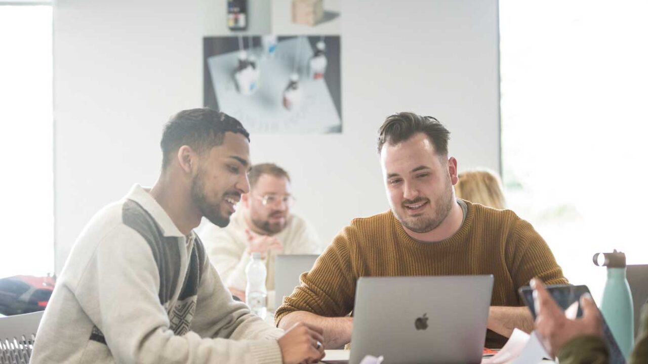 Jacob from Chase Design giving a student portfolio advice.