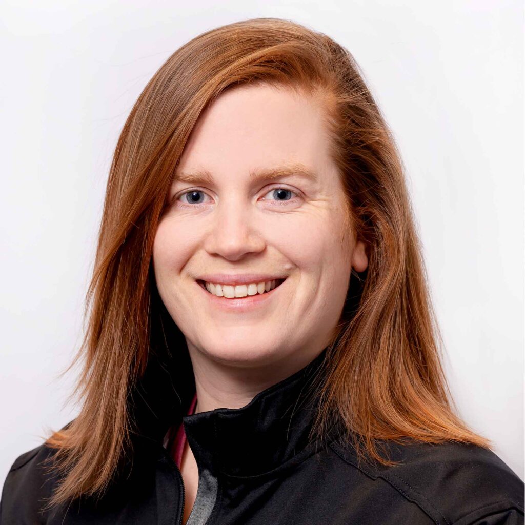 Head and shoulders photo of Dr Hayley Legg smiling.