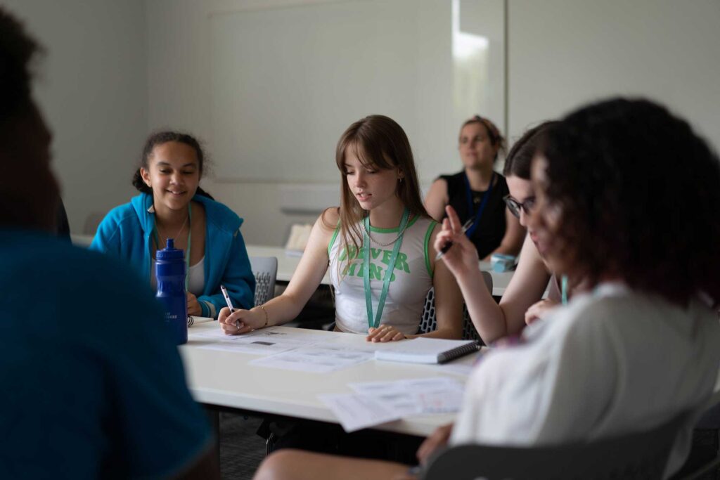 School students attending a residential subject taster session.