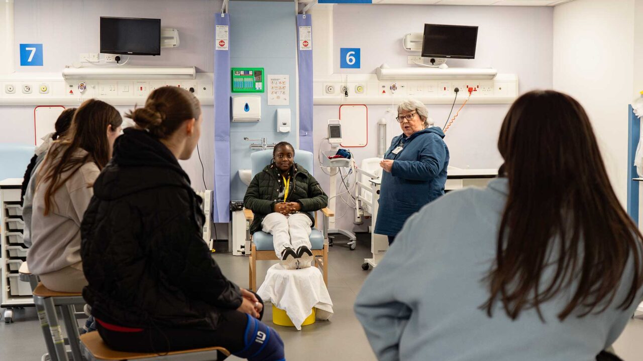 Students on an Outreach health and social care taster day in the mock hospital ward.