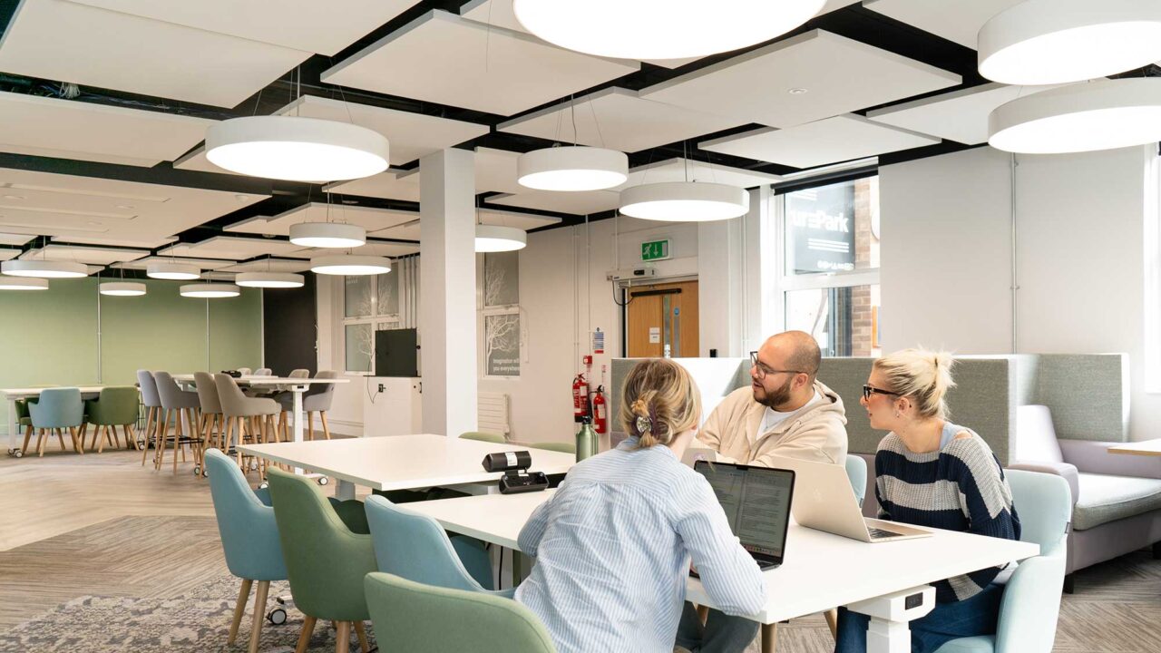 Students working on laptops in a break-out space in FuturePark.