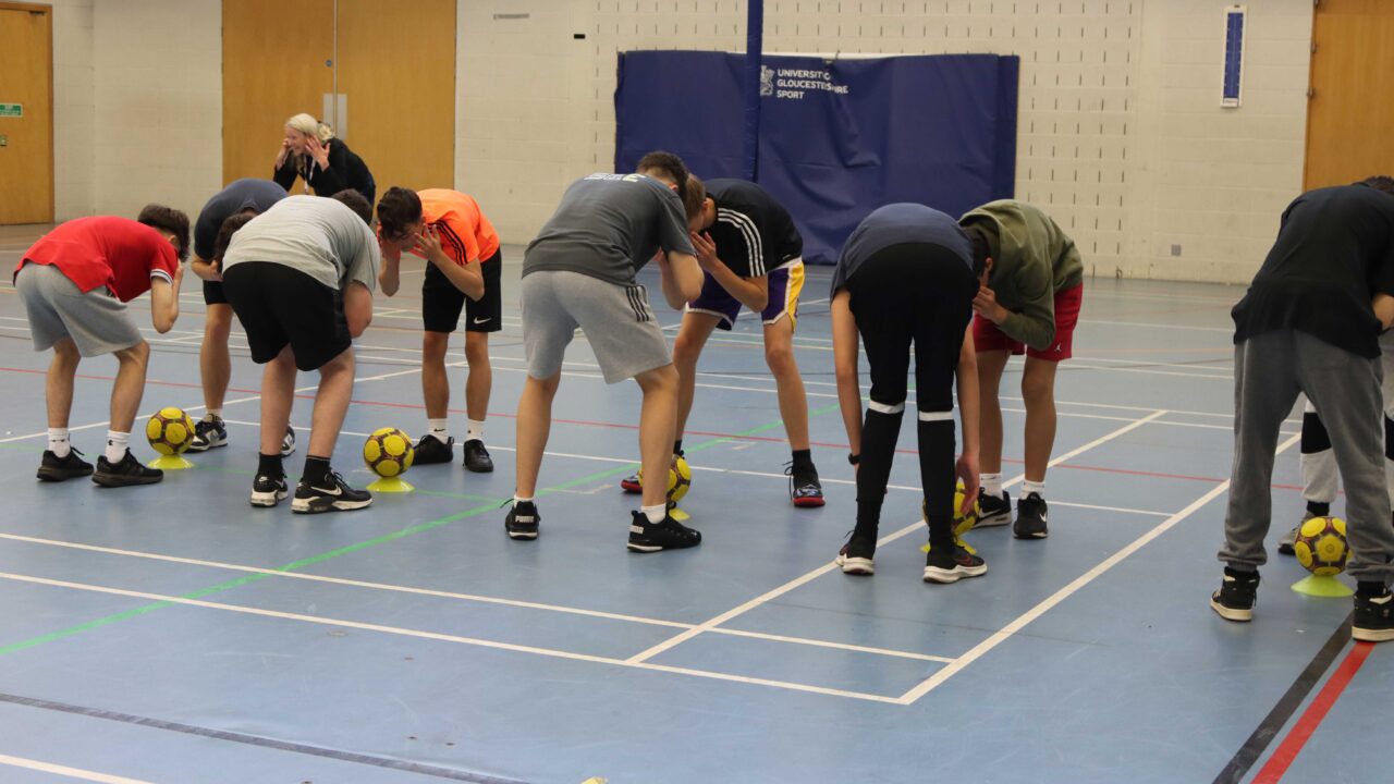 A group of students take part in a sporting activity during their residential stay.
