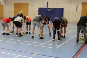 A group of students take part in a sporting activity during their residential stay.