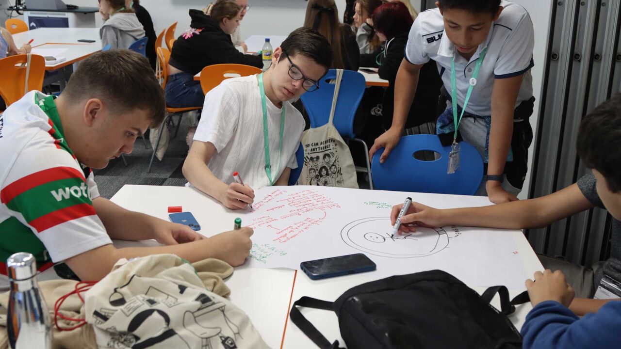A group of students working together in teams during a residential stay.