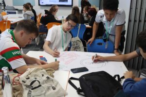 A group of students working together in teams during a residential stay.