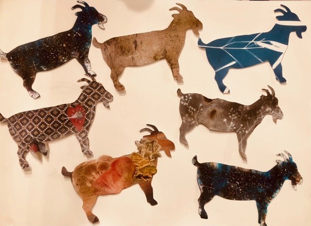 A selection of goat-cards with artwork on them for UoG's Greatest of All Time exhibition.