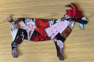 A goat postcard decorated with magazine cuttings in a collage.