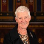 Head and shoulders photo of Ingrid Barker smiling.