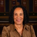 Head and shoulders photo of Tracey Harrison smiling.