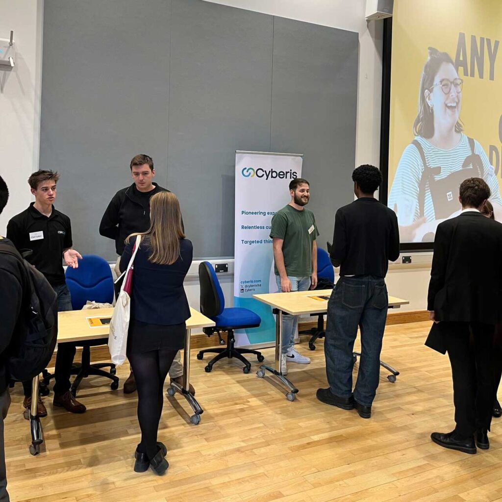 Students and employers talk together at the Cyber and Digital Launchpad event.