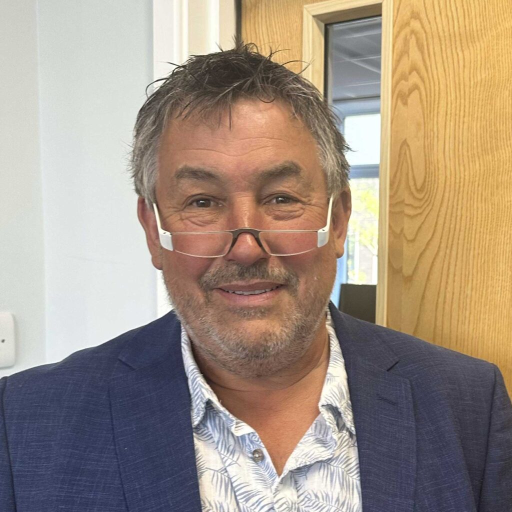 Head and shoulders photo of Peter Bungard smiling.