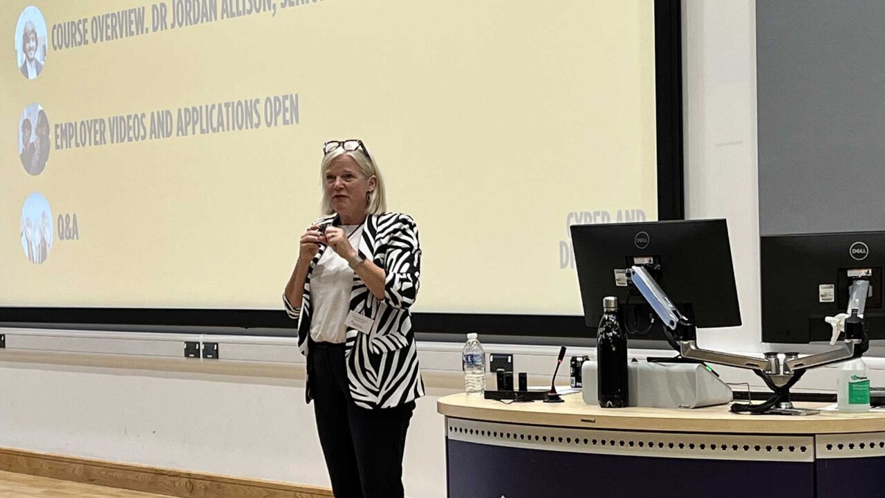 Dame Clare Marchant gives a presentation at the Cyber and Digital Launchpad event.