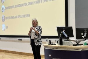 Dame Clare Marchant gives a presentation at the Cyber and Digital Launchpad event.