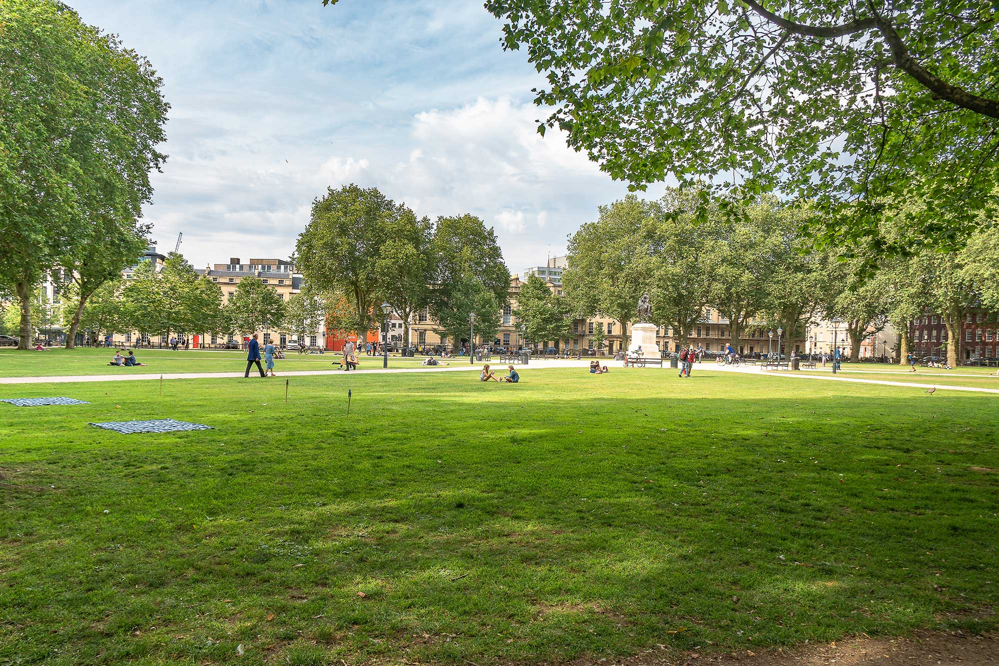 People enjoying a park in central Bristol.