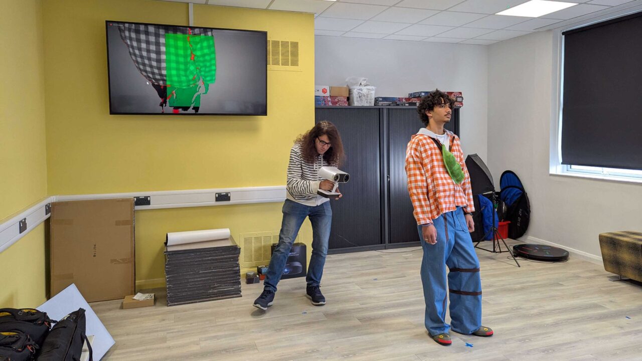 Computer Games students using the equipment in the Research Lab .