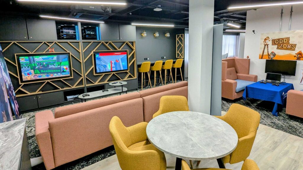 The Lobby in FuturePark showing soft seating, flat screens for gaming and sofas.