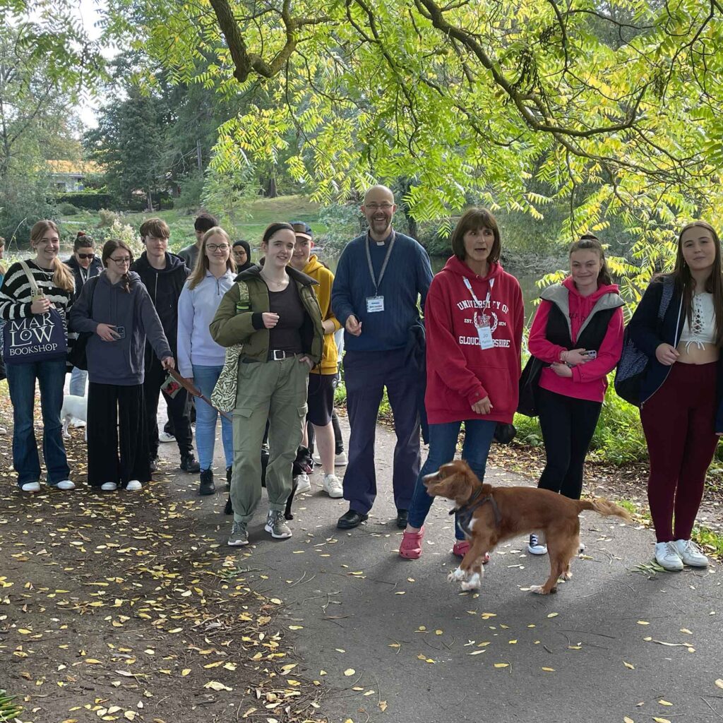 Two members of the Chaplain team on a Sanctuary arranged dog walk in the park.
