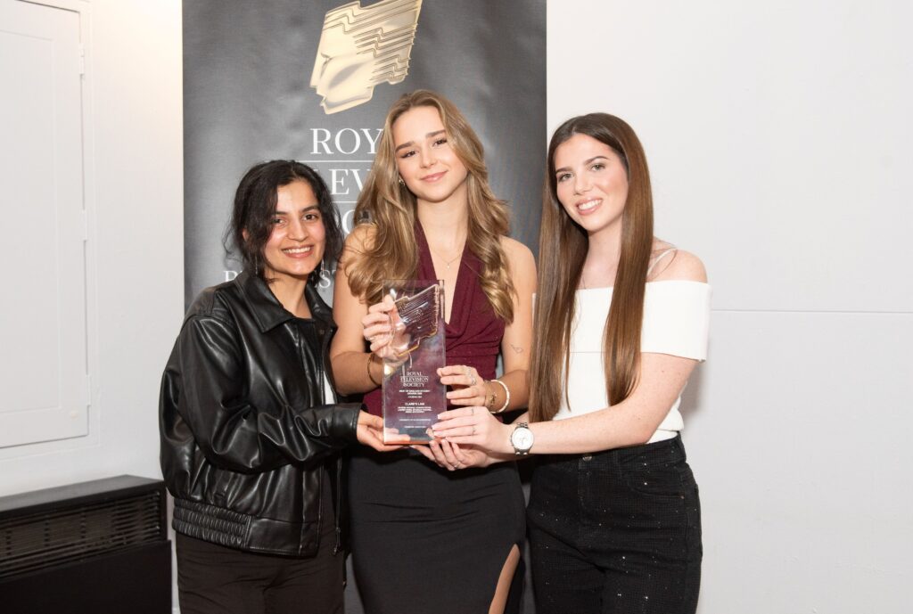 left to right, Spandan Pokhrel, Phoebe Brook, and Jemma McCoubrey holding their RTS award as a group