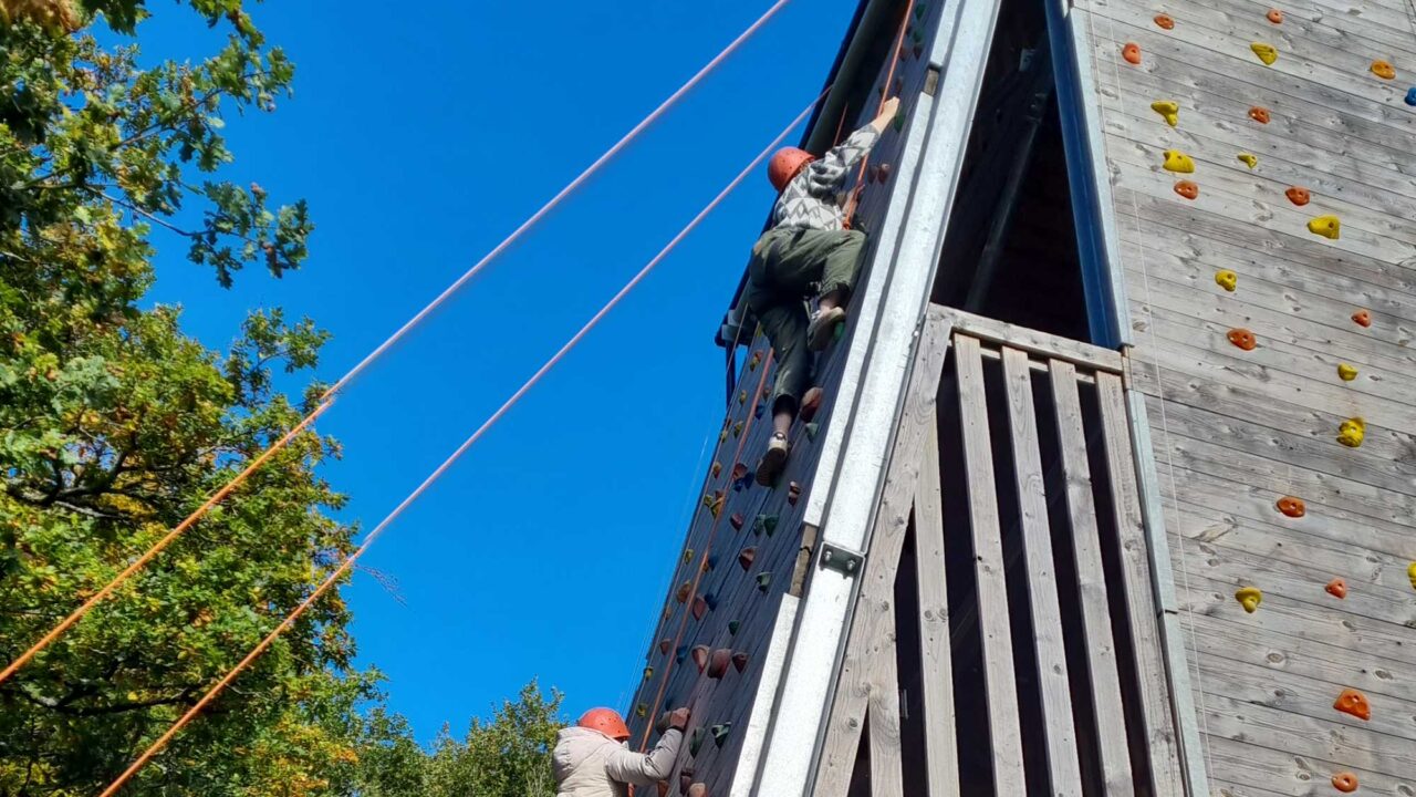 Education students on a climbing tower