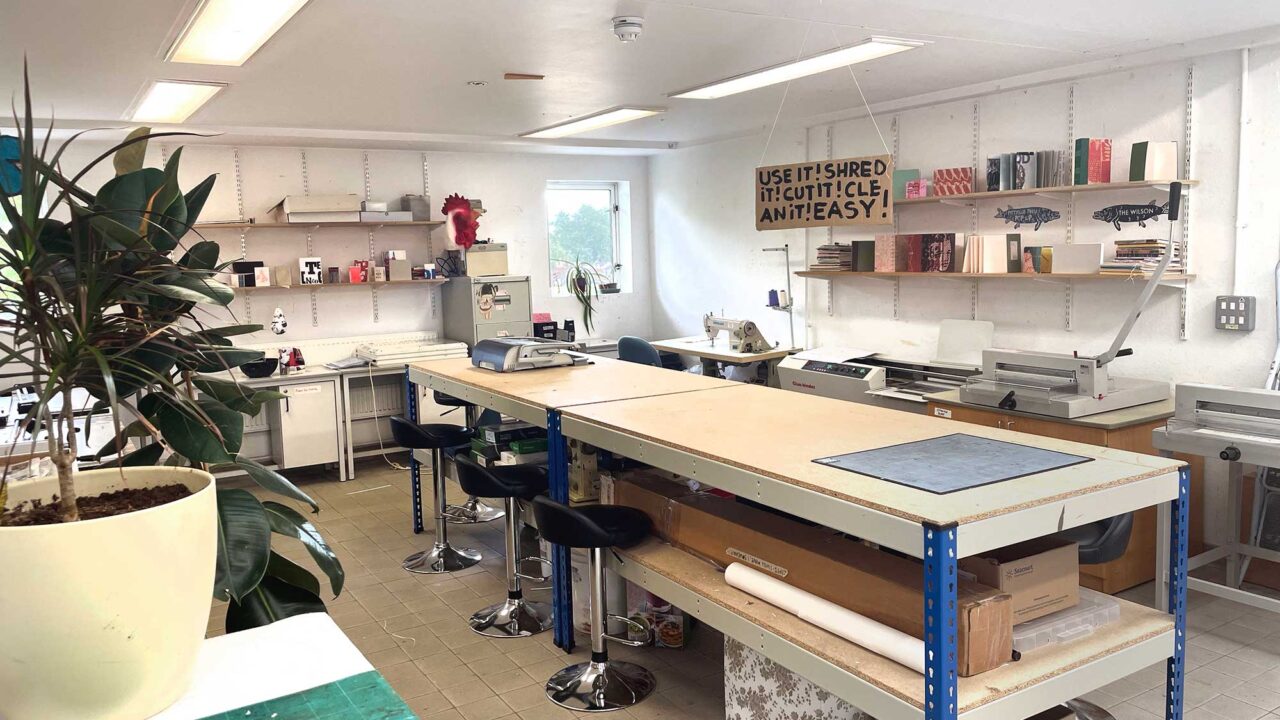 The illustration department's makers' space with worktops, printing equipment, sewing machine and other