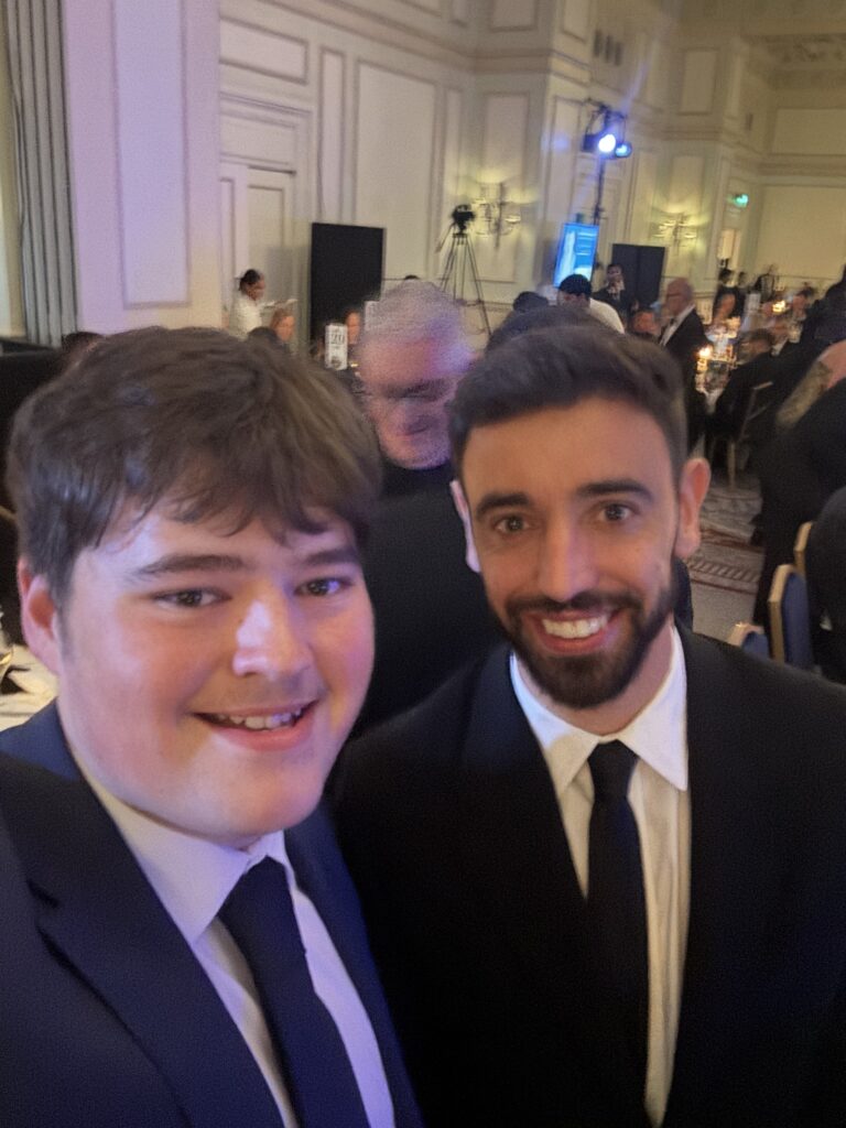 Billy Taylor with Bruno Fernandes