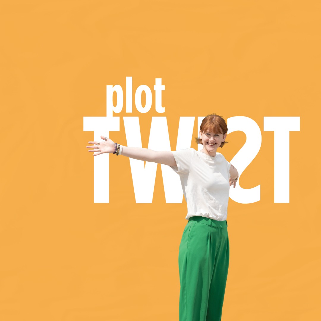 A student with their arms outstretched with the words Plot Twist behind her.