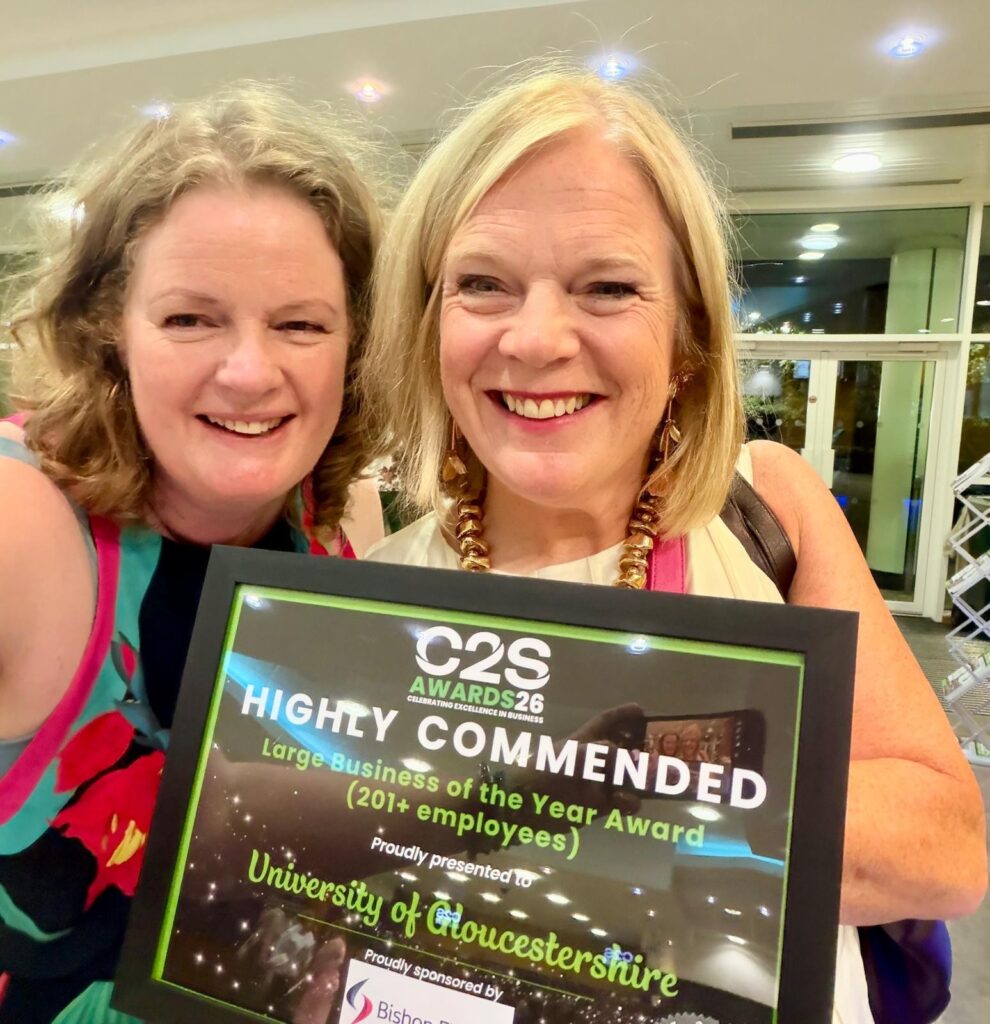 Nicola de longh, Chair of Council at University of Gloucestershire, and Dame Clare Marchant DBE, Vice-Chancellor at University of Gloucestershire, holding a certificate