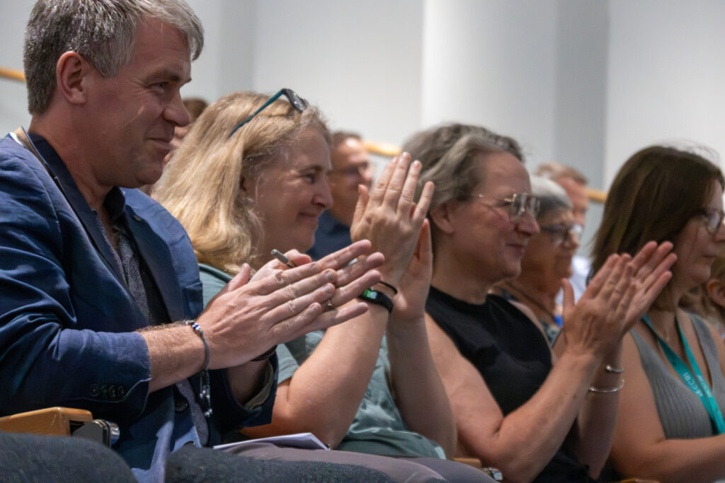 The audience clapping at Professor Matt Reed's inaugural lecture