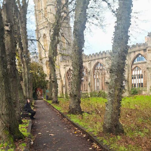 A view of Temple Church in Bristol from the gardens.